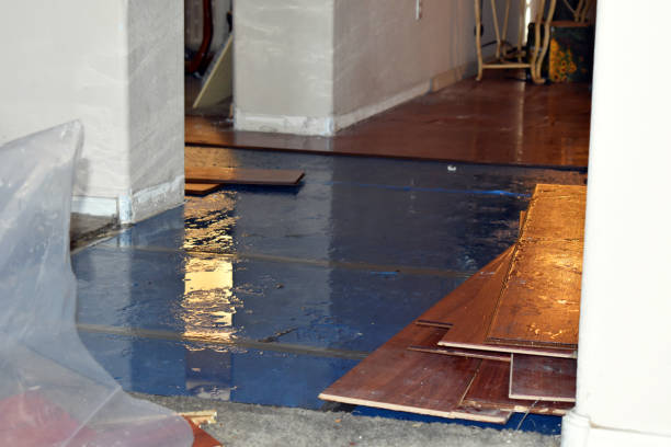 Professional Flood Damage Restoration technician working in Stratham, NH